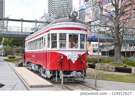 Round window tram on display in front of Gifu Station Round window tram on display in front of Gifu Station 124917627