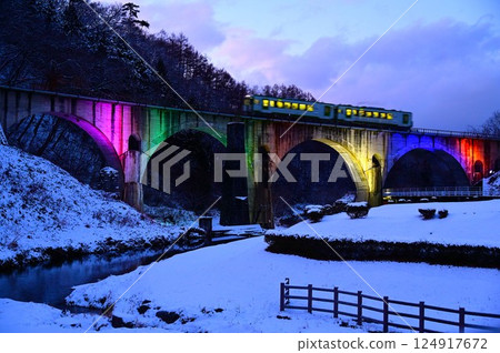 Winter illumination of Megane Bridge in Tono 124917672