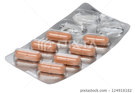 Silver blister pack containing orange oblong pills. Two compartments in the upper right corner of the pack are empty 124918182
