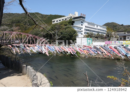 Carp streamers swimming in the river 124918942