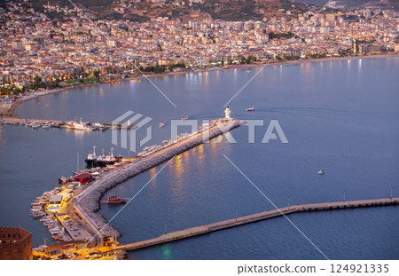 Alanya, Turkey. Evening aerial harbor view with cityscape and lighthouse 124921335