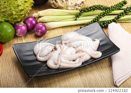 Delicous fresh raw uncooked octopus 124922182