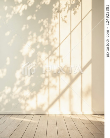 Minimalistic light background with blurred foliage shadow on white wall 124922883