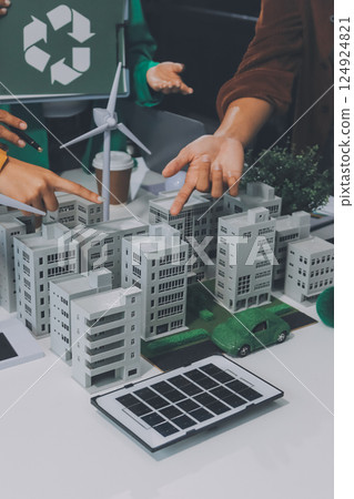 Asian business people team brainstorm meeting in green corporate office. Presentation ESG project planning. Environmental conservation, responsible business, sustainable development goal concept 124924821