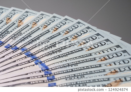 Background of money, new hundred-dollar bills with the front side. Background of dollars. 124924874