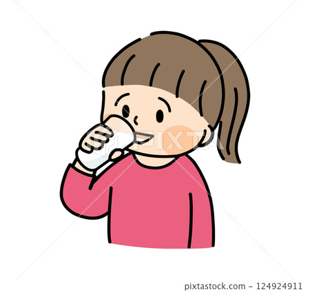 Smiling girl drinking a glass of milk Smiling girl drinking a glass of milk 124924911