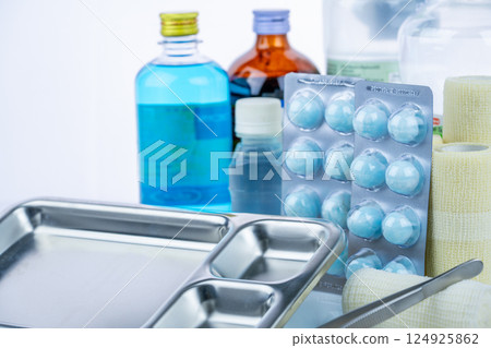 Medical equipment for treating infections. Wound care dressing set. Medical supplies for nurses. Conform bandage, forceps, cotton ball with alcohol. Sterile dressing materials. Healthcare equipment. Medical equipment for treating infections. Wound care dressing set. Medical supplies for nurses. Conform bandage, forceps, cotton ball with alcohol. Sterile dressing materials. Healthcare equipment. 124925862