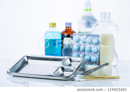 Medical equipment for treating infections. Wound care dressing set. Medical supplies for nurses. Conform bandage, forceps, cotton stick, alcohol. Sterile dressing materials. Healthcare equipment. 124925881