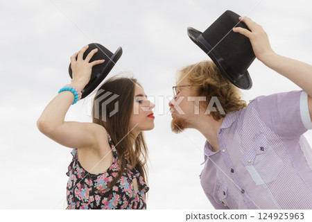 Vintage couple against sky 124925963