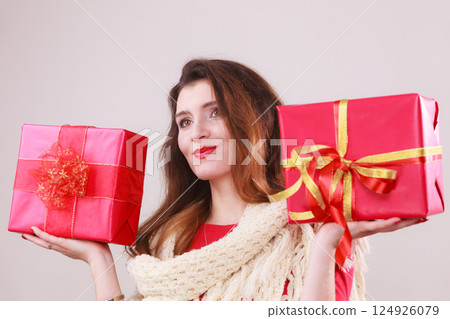 Woman with gifts. 124926079