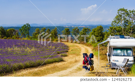 Clothes hanging to dry outdoors by camping car. Caravan vacation in France 124926273