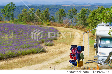 Clothes hanging to dry outdoors by camping car. Caravan vacation in France 124926283