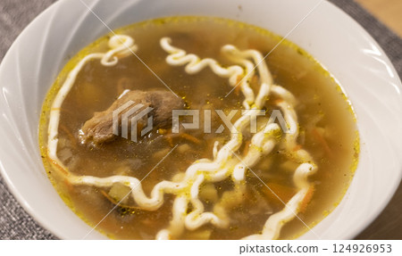 Close up shot of the bawl with soup Close up shot of the bawl with soup 124926953