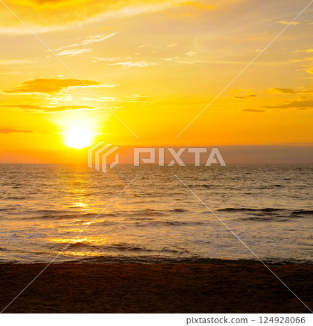 Sea and bright sunrise. Concept - travel. Sea and bright sunrise. Concept - travel. 124928066
