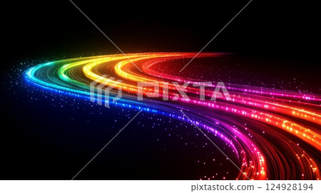 Rainbow colored light trails swirling on black background 124928194