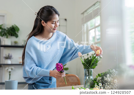 Flower arrangement workshop home interior lifestyle content bright environment casual view creative expression 124928507