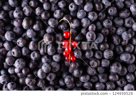Red berries pattern isolated on a white background. Strawberries, blueberries, raspberries, red currant fruits. Creative fruit food concept. Flat lay texture 124930528