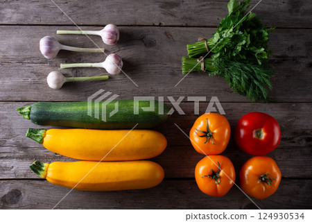vegetable composition on a wooden background spring vegetarian composition 124930534