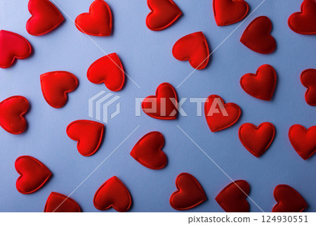 texture pattern of red hearts on blue cyan background Valentines day card concept. Heart for Valentines Day Background 124930551
