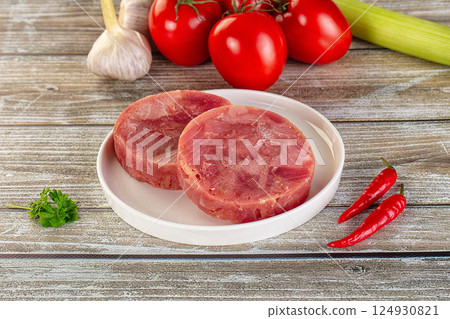 Raw round tuna fish fillet 124930821