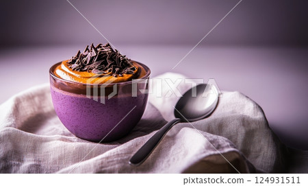 Airy food photo of chocolate and vanilla mousse in pastel setting, emphasizing softness, lightness, and indulgent texture 124931511