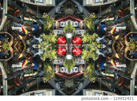 Outdoor cafe kaleidoscope pattern reflecting lively ambiance and vibrant colors 124932421