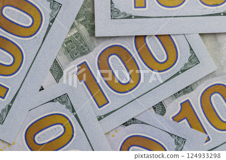100 face value for US dollars, American dollars with a face value of one hundred dollars, reverse of a group of banknotes 124933298