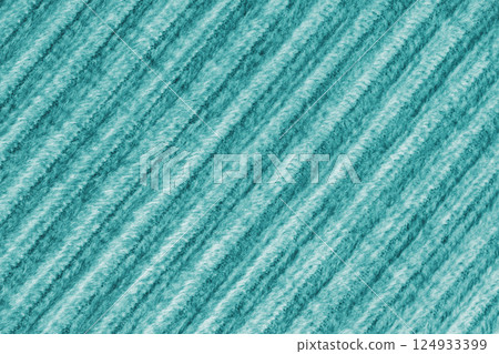 Ridge fluffy macro texture corduroy turquoise cloth. Large ribbed, diagonal weaving fabric background 124933399