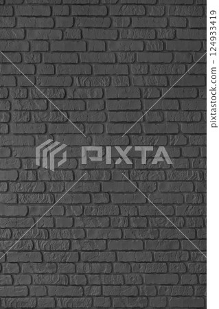 Black color painted brick wall texture, brickwork, masonry of stone blocks vertical background Black color painted brick wall texture, brickwork, masonry of stone blocks vertical background 124933419