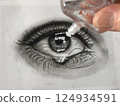 Putting eye drops into the illustrated eye 124934591