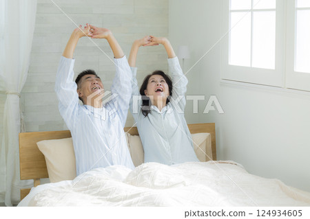 Senior couple waking up Senior couple waking up 124934605
