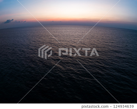 Beautiful sunset or sunrise sky nature landscape in Thailand,Amazing landscape colorful clouds over mountains in summer season background,Wide angle view drone shot 124934639
