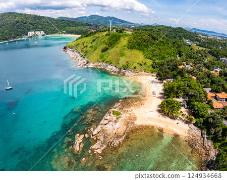 Beautiful seashore nature landscape in phuket Thailand,Amazing landscape waves crashing on rock in summer season background,Wide angle view drone shot 124934668