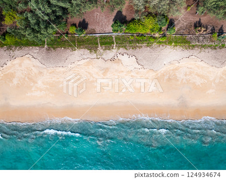 Beautiful seashore nature landscape in phuket Thailand,Amazing landscape waves crashing on rock in summer season background,Wide angle view drone shot 124934674