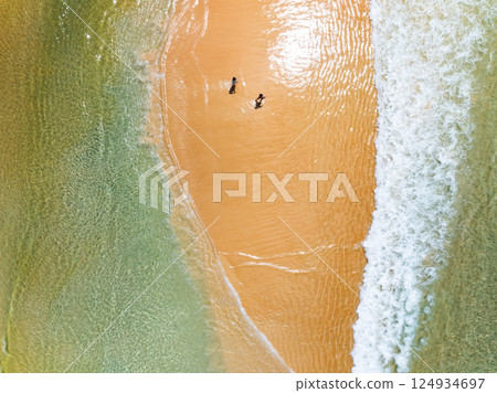 Sea surface aerial view,Bird eye view photo of waves water surface texture,Summer sea background,Beautiful nature Amazing view sea background 124934697