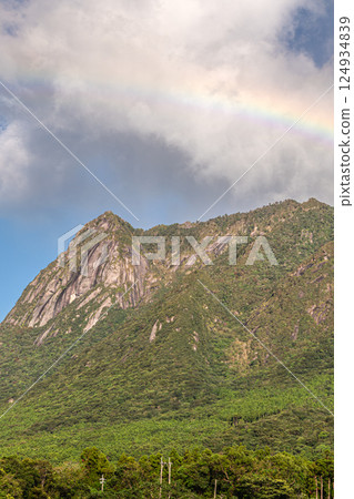 Yakushima World Natural Heritage Site: Mt. Mochomu and a Rainbow (September) 124934839