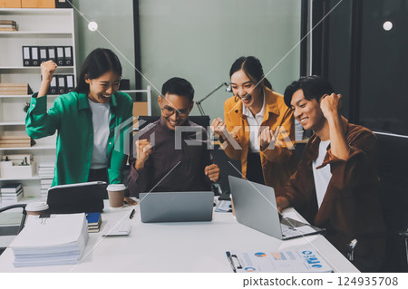 Business team showing unity with their hands together, Close up top view of young business people putting their hands together. people together to work as team to ensure the success of the business Business team showing unity with their hands together, Close up top view of young business people putting their hands together. people together to work as team to ensure the success of the business 124935708