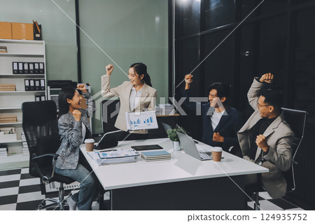 Business team showing unity with their hands together, Close up top view of young business people putting their hands together. people together to work as team to ensure the success of the business Business team showing unity with their hands together, Close up top view of young business people putting their hands together. people together to work as team to ensure the success of the business 124935752