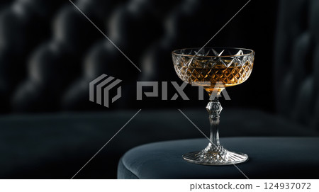 high end whiskey cocktail served in crystal glass, exuding elegance high end whiskey cocktail served in crystal glass, exuding elegance 124937072