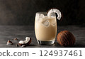 Creamy coconut milk drink with ice and coconut slices, refreshing and delicious 124937461