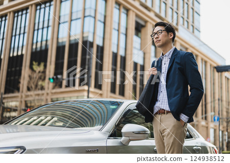 Businessman, car, city 124938512