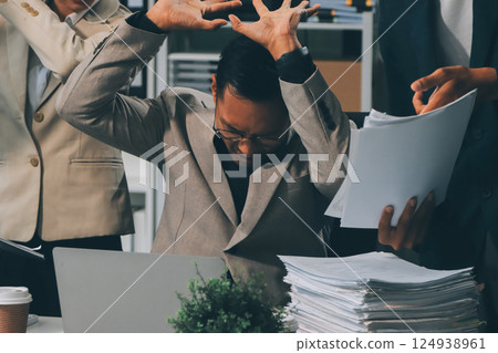 Large group of worried business people having a meeting. 124938961