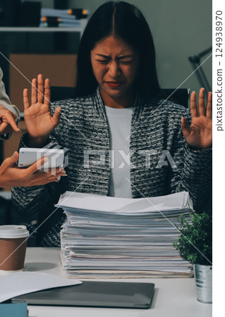 Large group of worried business people having a meeting. Large group of worried business people having a meeting. 124938970