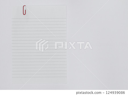 white paper with paperclip. white paper with paperclip. 124939086