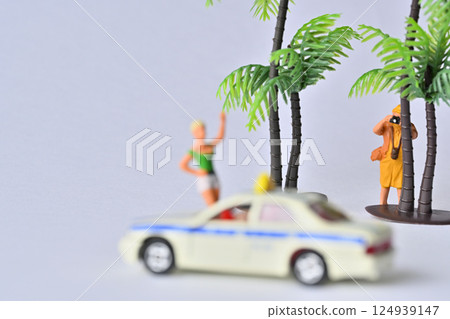 A woman taking a picture with a camera 124939147