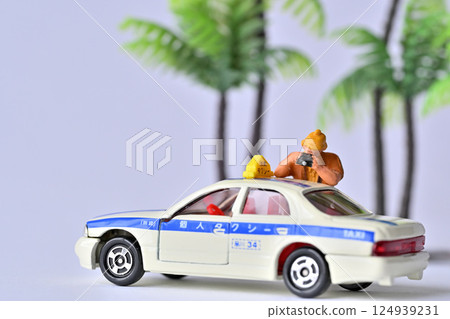 A woman taking a picture with a camera A woman taking a picture with a camera 124939231