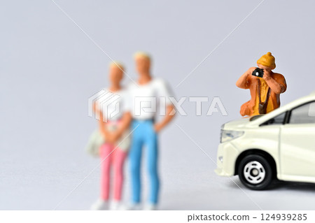 A woman taking a picture with a camera A woman taking a picture with a camera 124939285