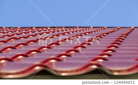 Red metal roof tiles 124940051