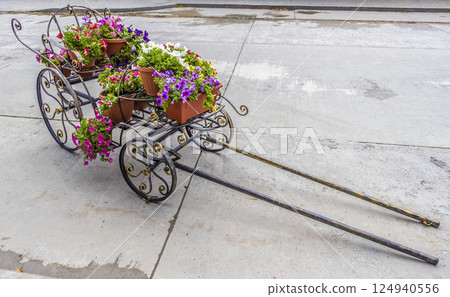 Cart with flowers Cart with flowers 124940556