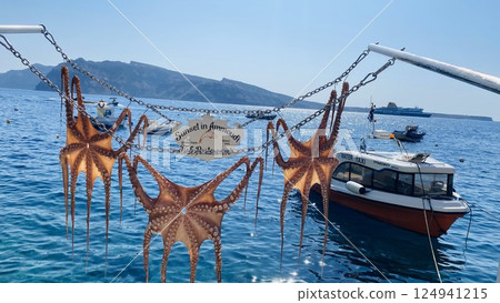 Santorini fishing port on a clear blue day Santorini fishing port on a clear blue day 124941215